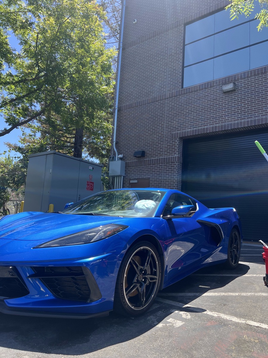 Blue Corvette C8 exterior after mobile detailing with a mirror gloss finish