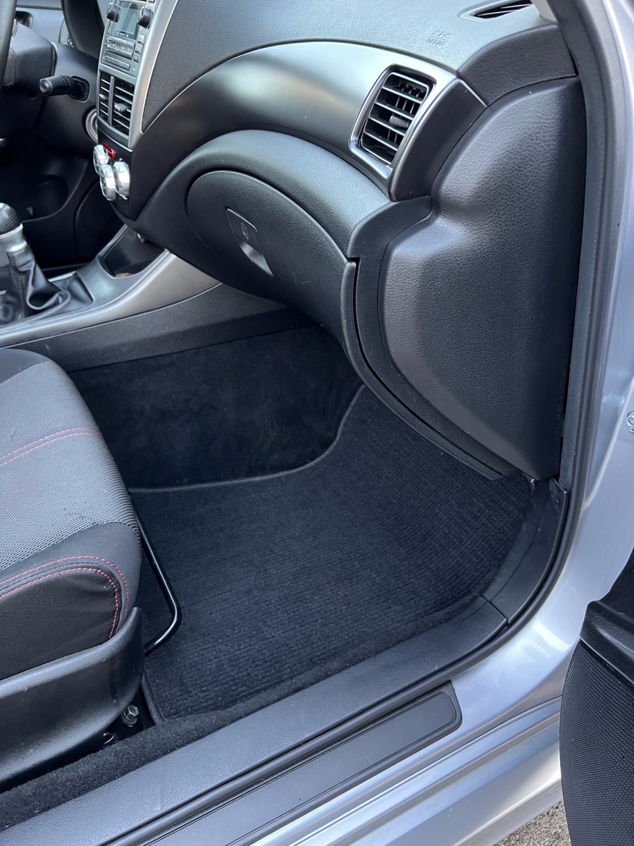 Clean car interior footwell and dash after detailing