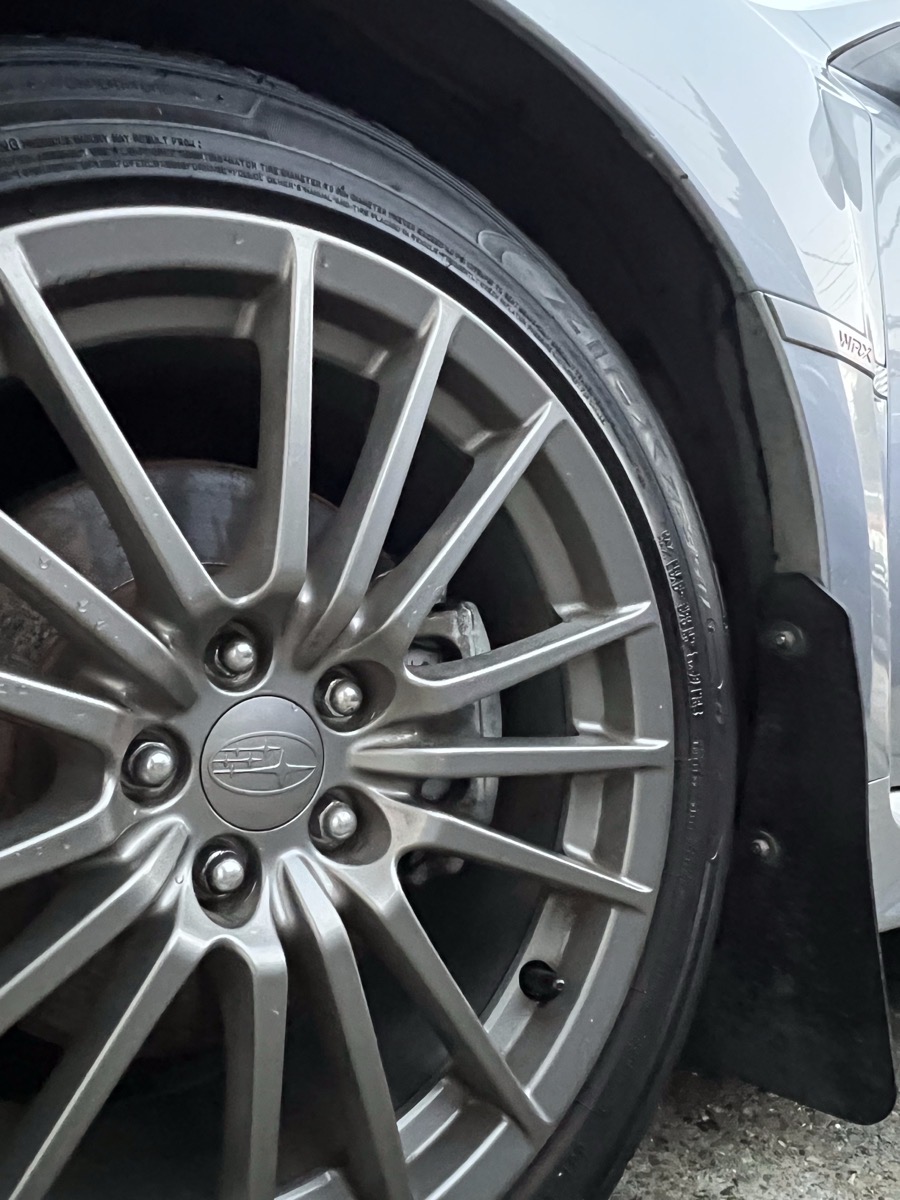 Subaru WRX wheel clean and glossy after detailing